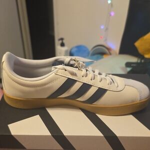 Adidas Women's White Sneakers with Black Stripes